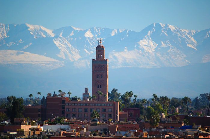Marrakech Jemaa el-Fna square at twilight with traditional food
stalls and crowds
