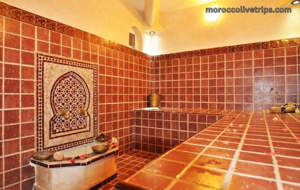 Traditional Moroccan hammam interior with tiled marble slabs and steam in Marrakech